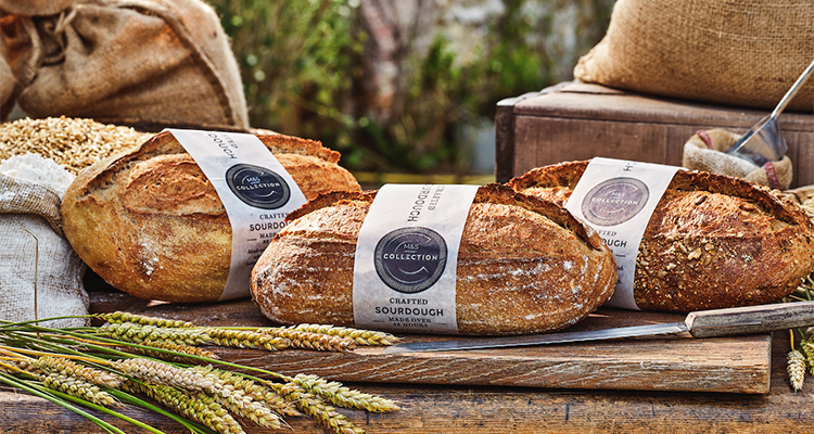 Sourdough loaves of bread on a rustic table