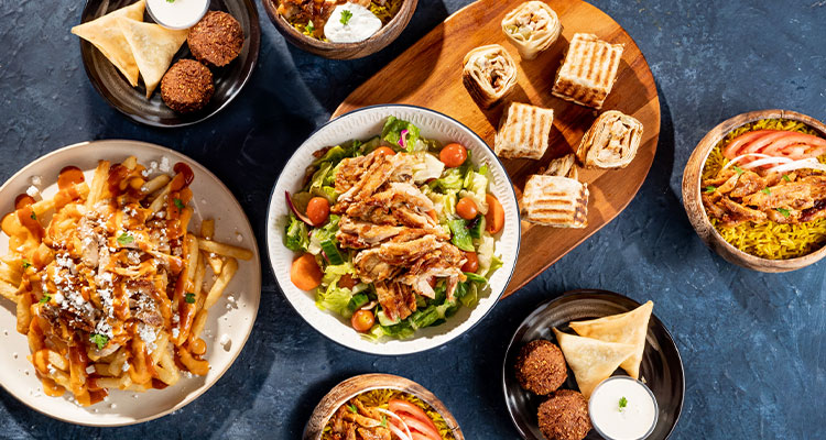 a variety of dishes from Tahini's Ultimate Family Platter