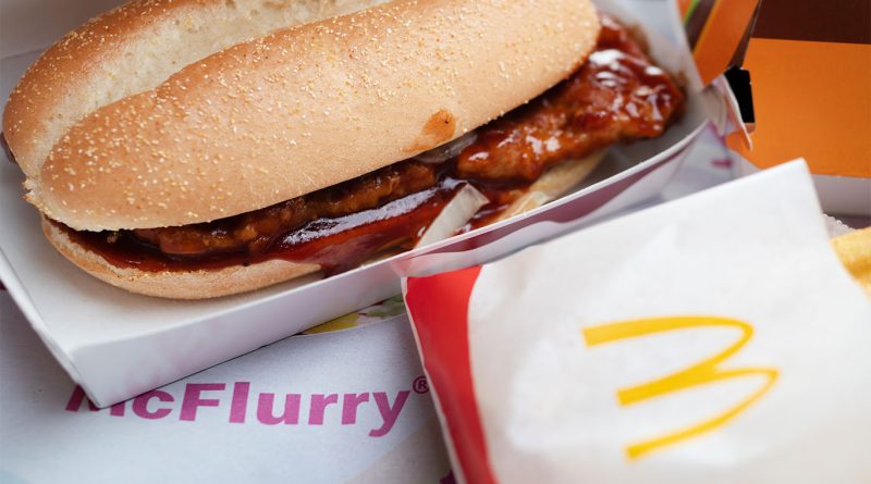 McDonald’s McRib sandwich on a bun with barbecue sauce, onions and pickles